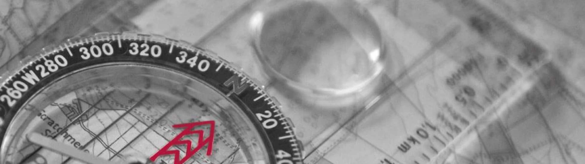 Compass laid over a map | Atradius