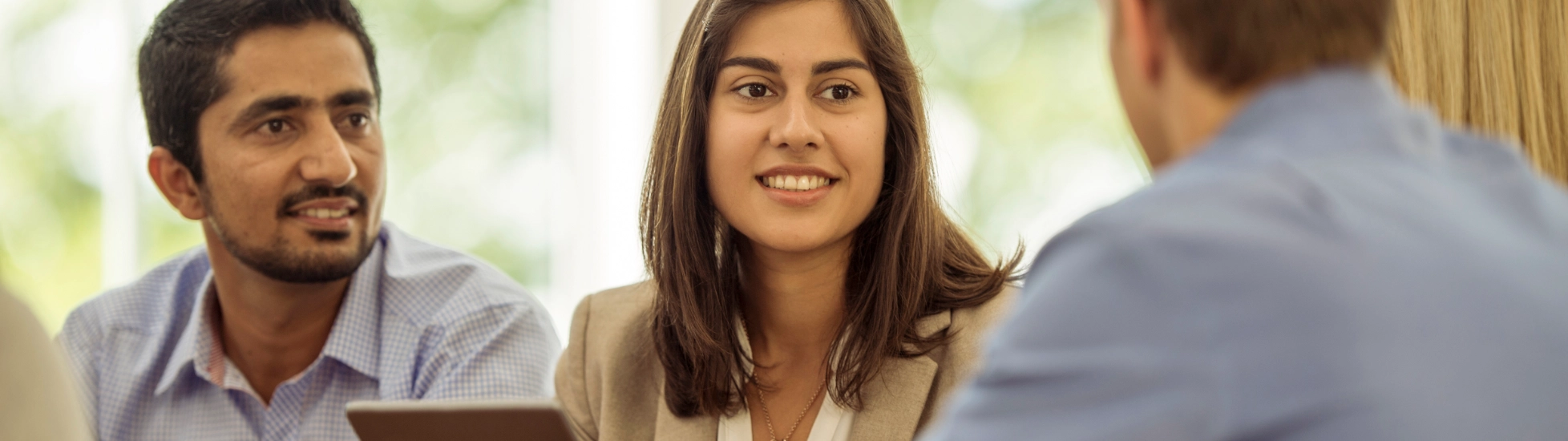 men and woman in a meeting